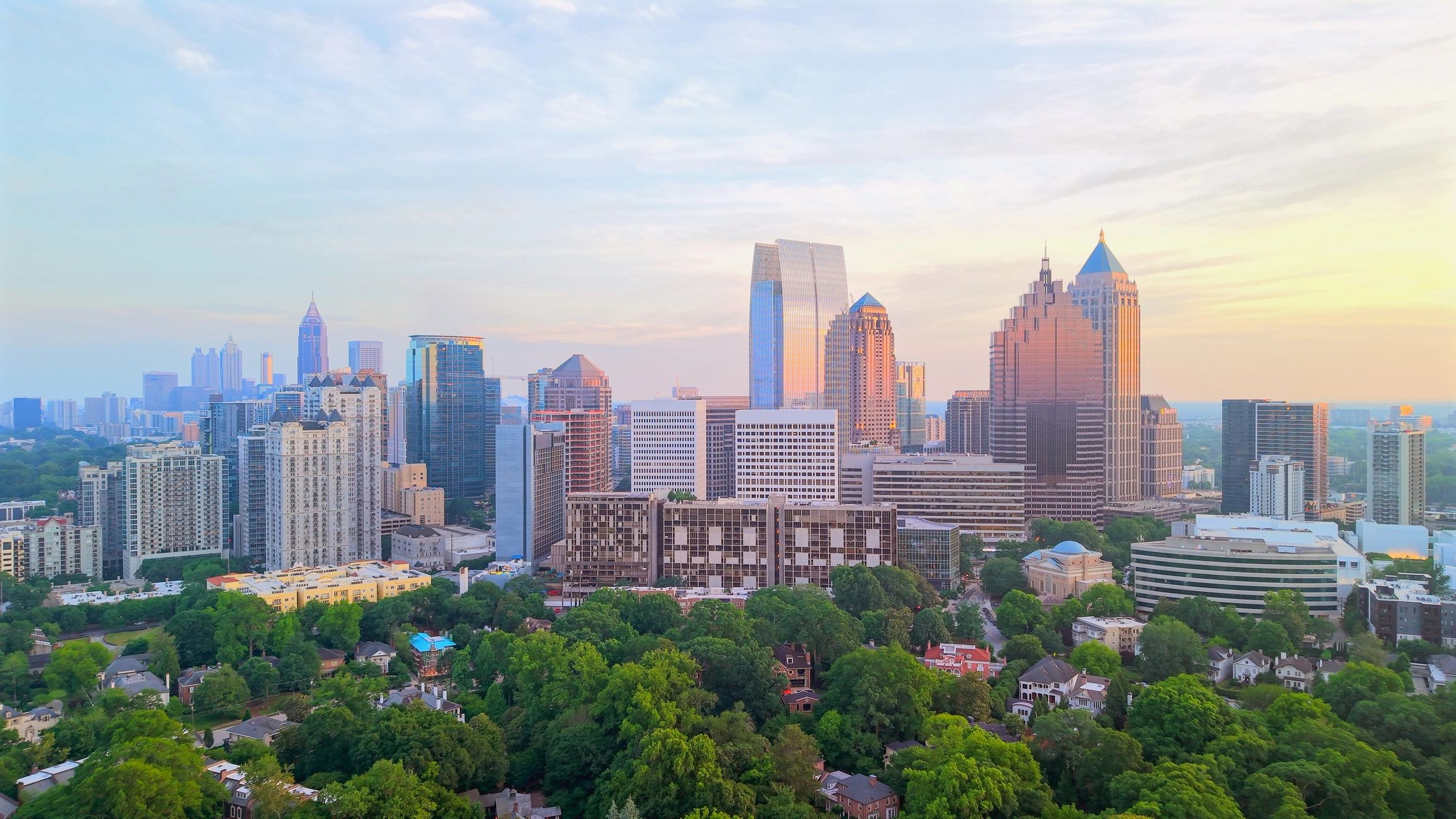 Commercial skyline representing office and mixed-use assets